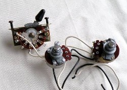 Pots and a switch. Bust out the soldering iron.